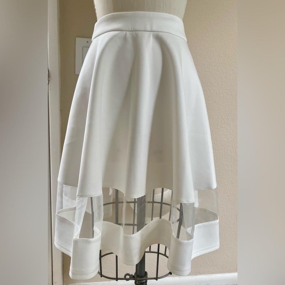 Elegant White Sheer Panel Skirt Size Small. Never worn. No tags.